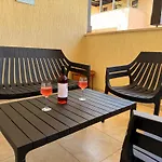 Queens Gardens - Kato - Next To Kings Ave Mall --- By Yiota